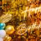 Floating balloons bring an airy and magical feel to this exquisite birthday celebration.