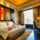 Rose petals on the bed will add a romantic flair between the two.