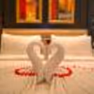 ndulge in a romantic room decorated with flowers.