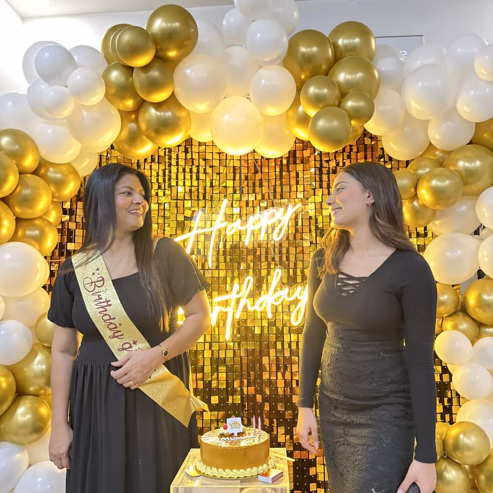 Make a statement with this golden sequin backdrop for your birthday party.