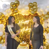 Make a statement with this golden sequin backdrop for your birthday party.