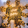 Make a statement with this golden sequin backdrop for your birthday party.