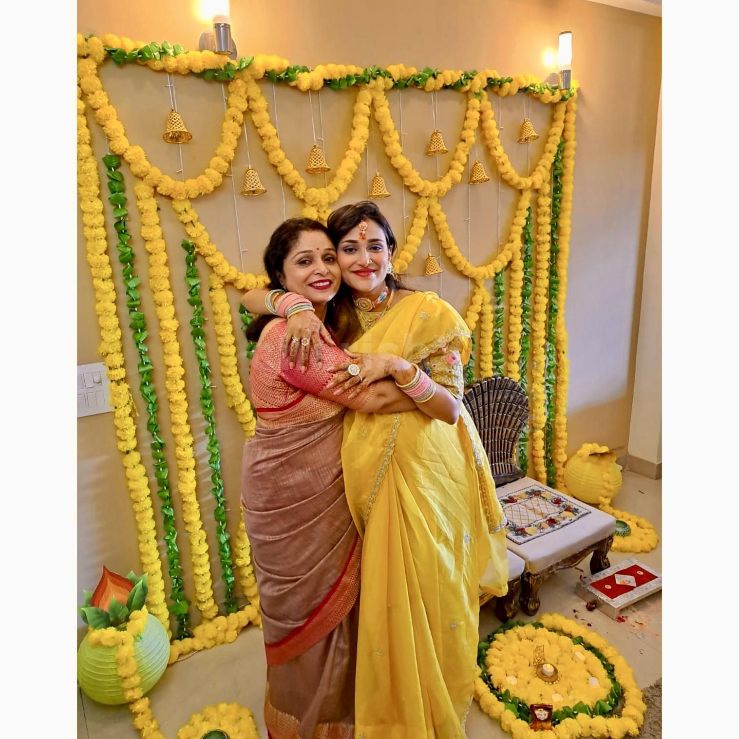 A whimsical haven crafted with marigold flowers and green garlands.