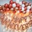 The rose gold balloons and pink and rose gold balloons create a captivating ambience.