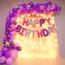 Immerse yourself in a dreamy world with this enchanting lavender-themed birthday decoration, creating an ambience of serenity and elegance.
