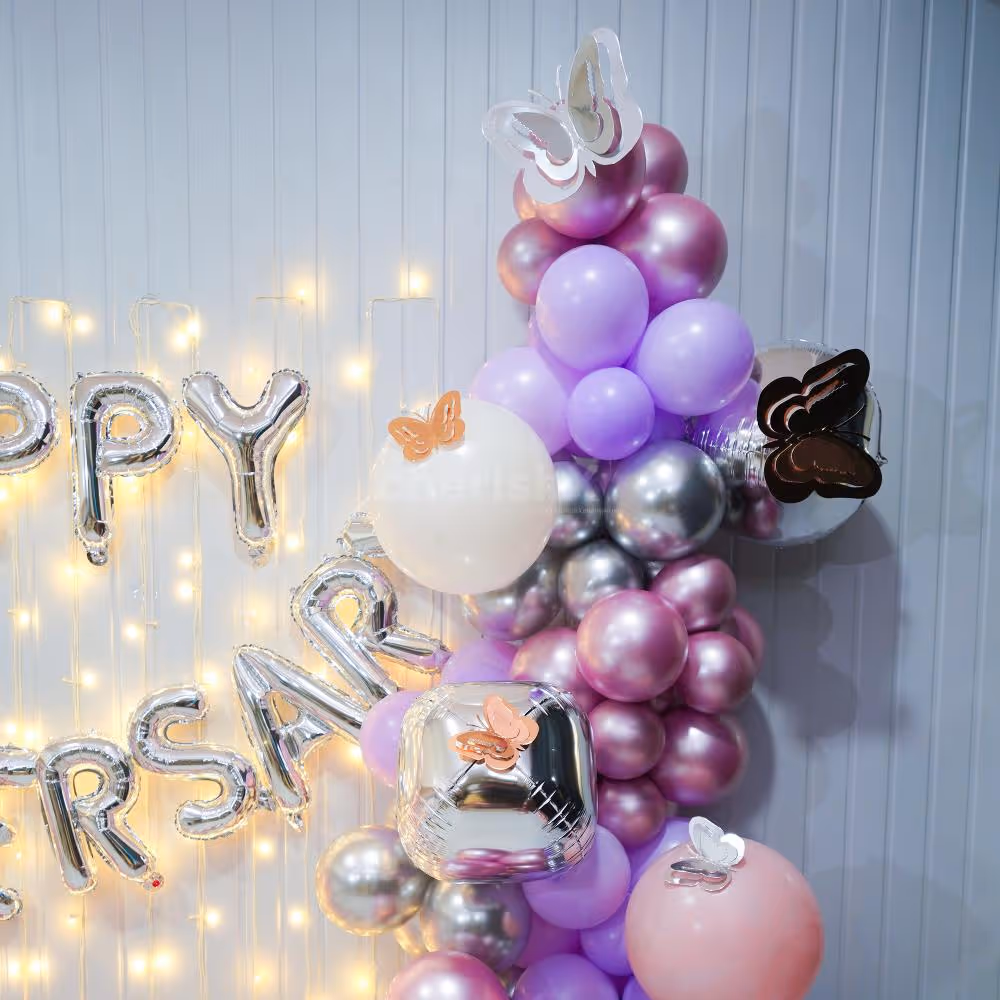 Step into a dreamy wonderland adorned with captivating balloons and a sprinkling of confetti, perfect for your anniversary celebration.