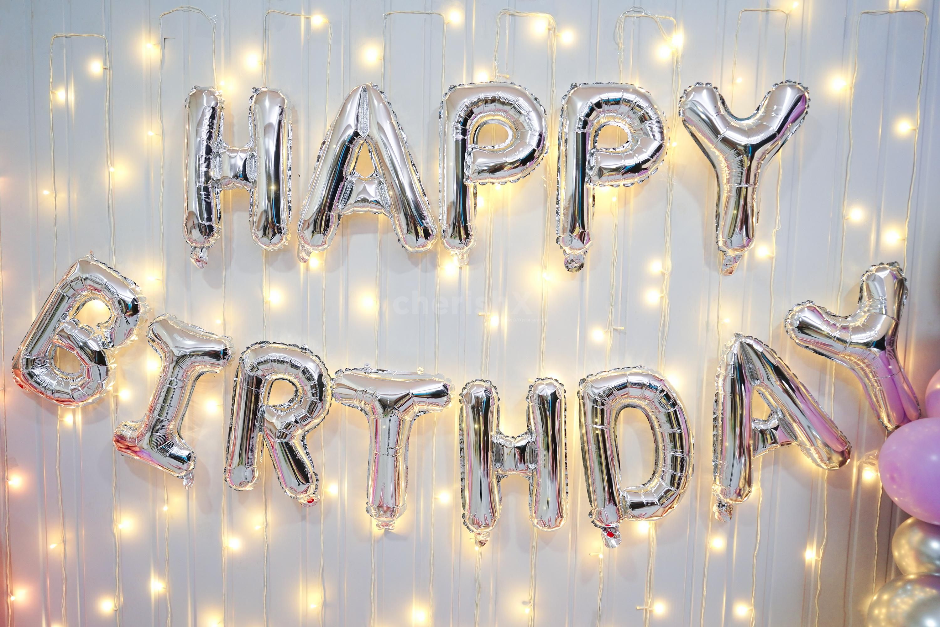 The vibrant celebration with a combination of Purple pastel, chrome pink, Chrome Silver, and Purple latex balloons create a lively and festive atmosphere.