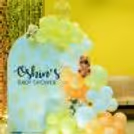 A burst of colourful balloons sets the perfect celebratory mood.