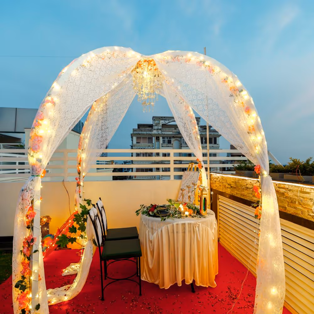 The soft glow of flickering candlelight casts a warm and intimate glow.