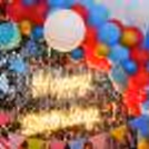 No party is complete without some fun pictures, and a carnival-themed photobooth is an ideal background.