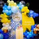Dreamy arrangement of balloons in hues of yellow, white, and blue.5