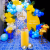 Picture-perfect moments await amidst a backdrop of sun board cutouts, a captivating 'Oh Baby' centrepiece, and a burst of yellow, white, and blue balloons.