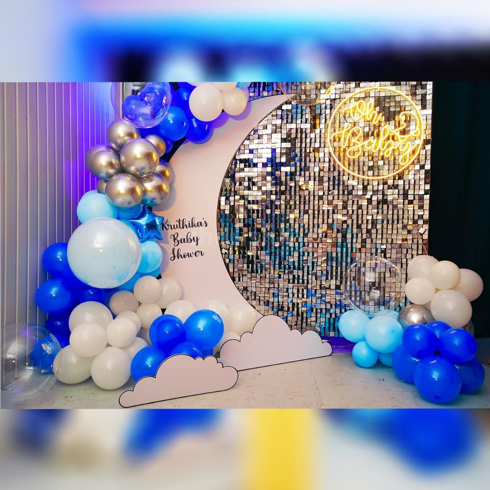 Capture picture-perfect moments against our stunning baby shower backdrop adorned with a shimmering Sequence panel and an illuminating Oh Baby Neon Light.q