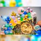 The burst of colourful balloons against the backdrop creates an enchanting and playful ambience that is sure to bring smiles to everyone's faces.