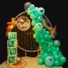 The serene mint green colour palette sets the stage for a dreamy baby shower celebration.