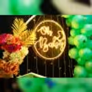 The combination of a mesmerizing ring stand, Oh Baby Neon Light, and intricate butterfly cutouts evoke a sense of joy and anticipation.