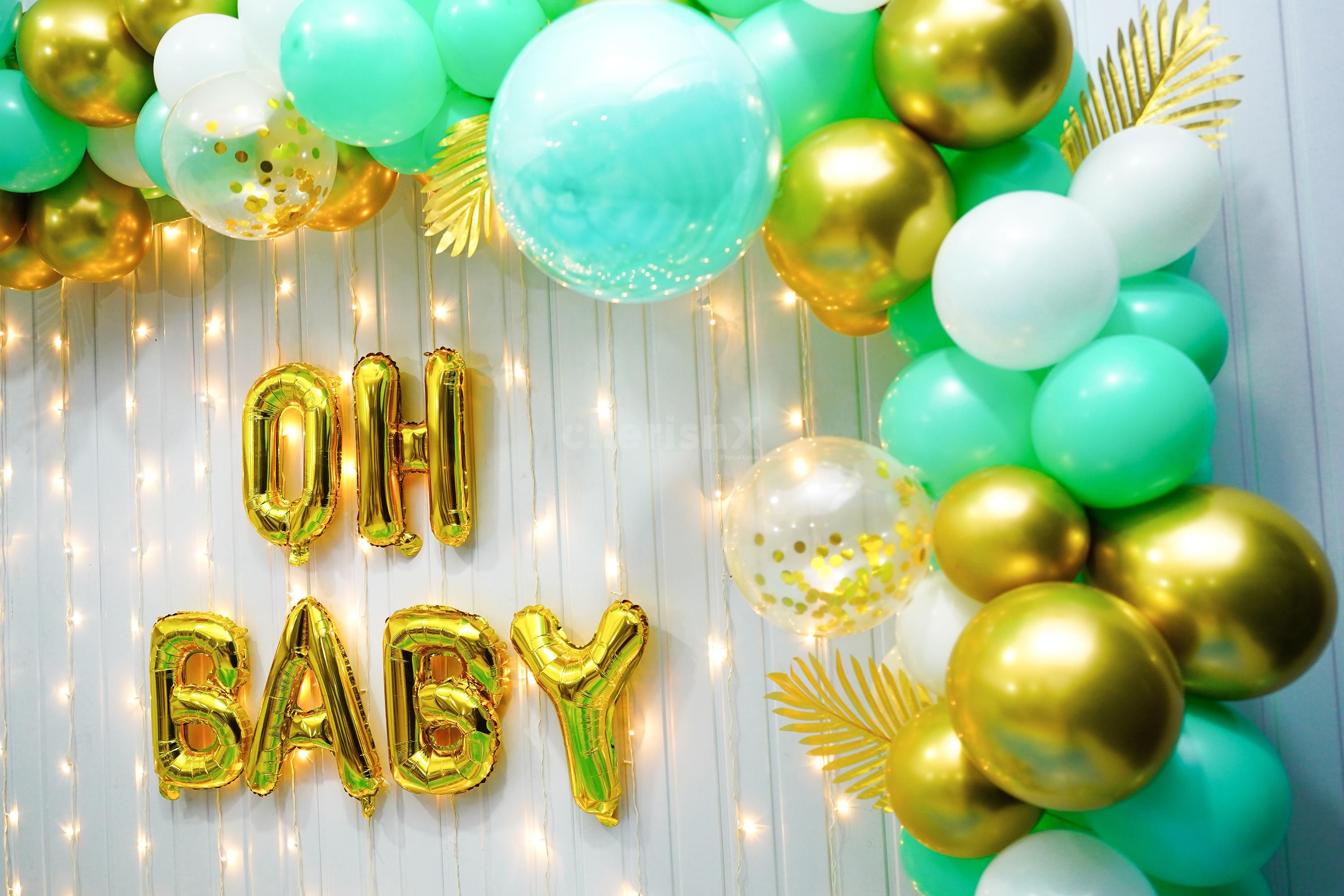 The LED lights add a touch of glamour and sparkle to this baby shower decoration.