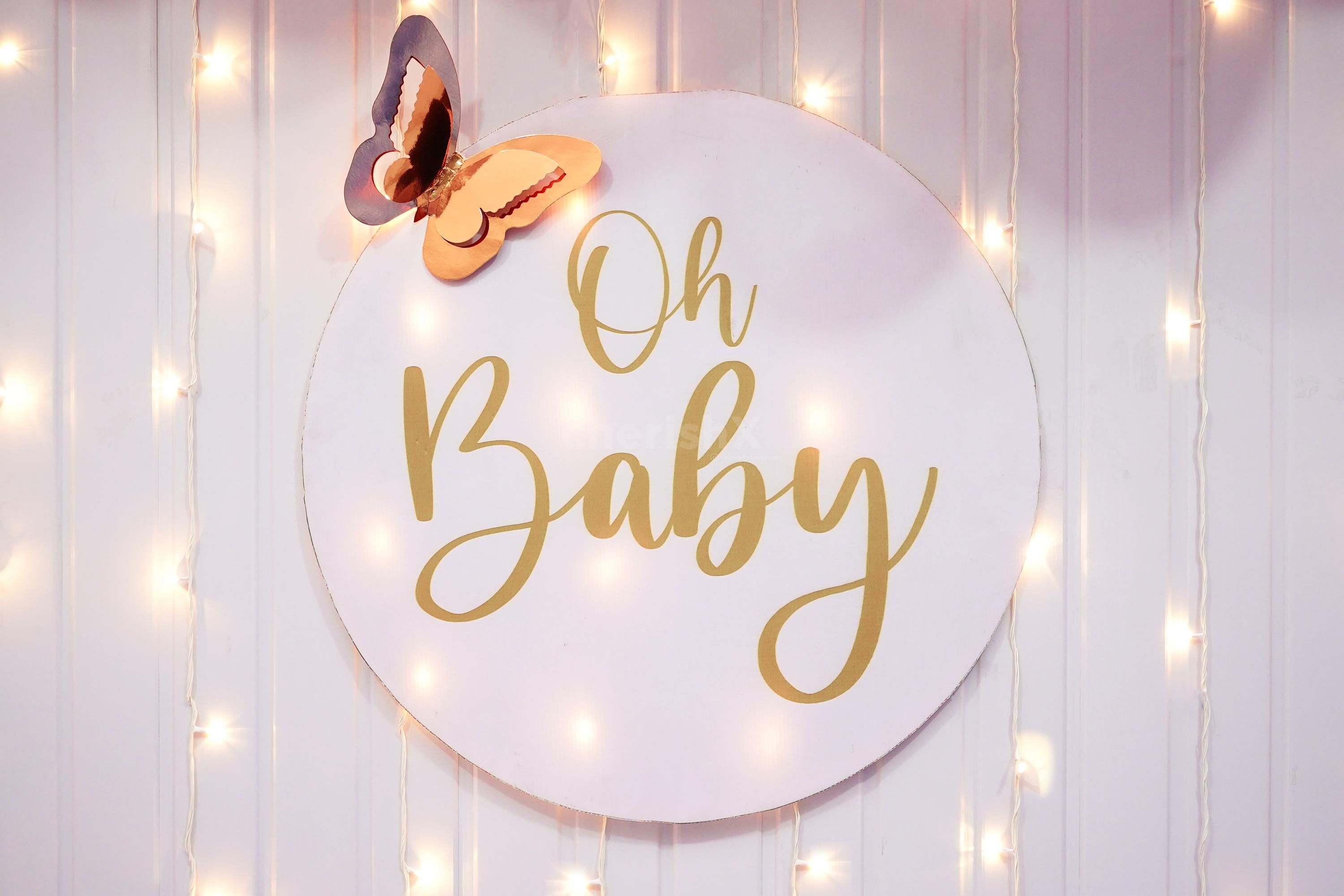 This decoration features a stunning arch of Light Pink and Rose Gold Balloons, creating a tender look.