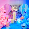 A perfect blend of pastel balloons, twinkling lights, and enchanting decor elements.
