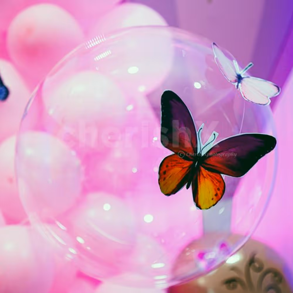A perfect blend of pastel balloons, twinkling lights, and enchanting decor elements.