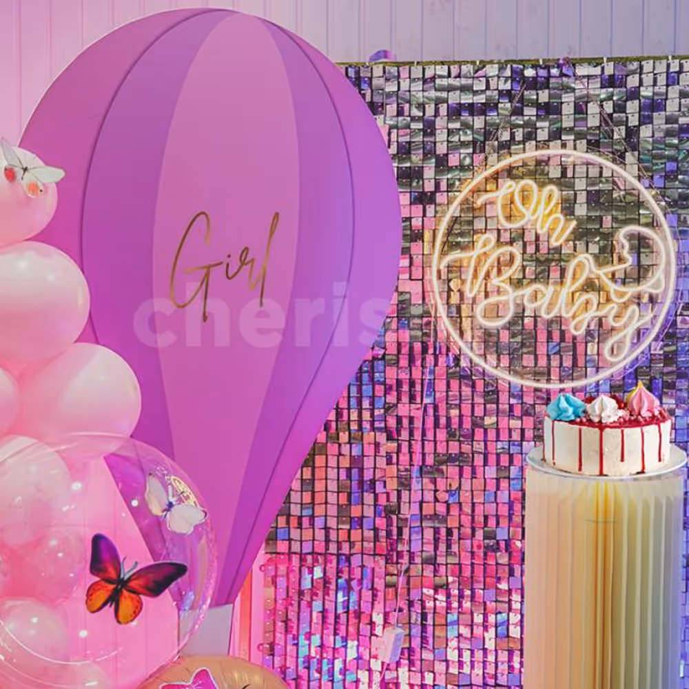 Experience the blissful ambience created by a harmonious mix of pink and blue bubble balloons, symbolizing the arrival of your precious little one.