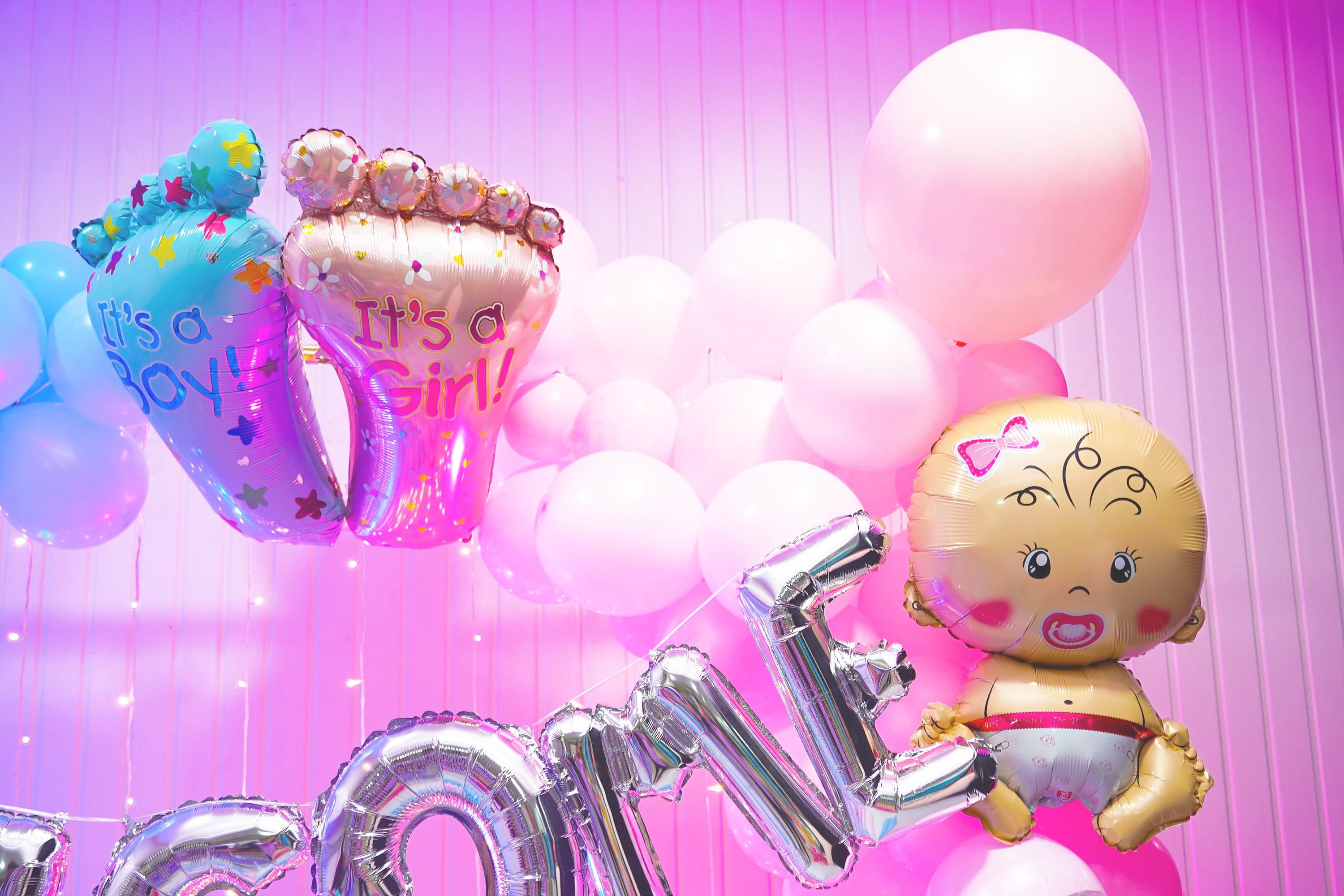 A symphony of pastel hues and shimmering lights welcomes your twins into a world full of love and wonder.
