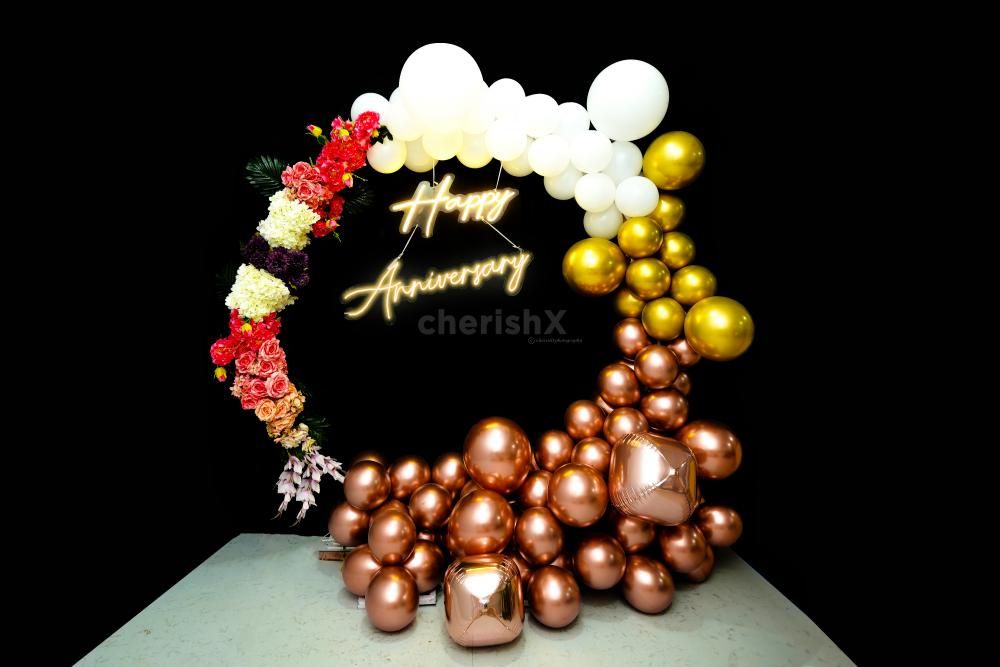 Transform Your Anniversary into a Magical Celebration with our  Golden Glitz & Fantasy Decor.