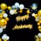 Mesmerize Your Guests with a Golden Arch and Balloon Delight.