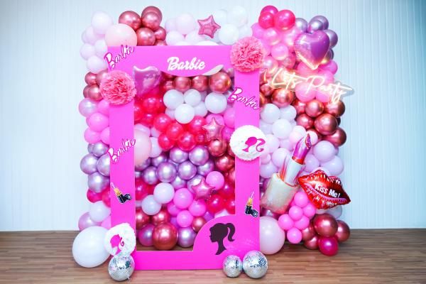 Enchanting and Glamorous Barbie theme birthday decor comes with pastel pink, magenta, and white balloons.