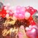 Eye-catching disco foil balloons add an extra dose of glitz and glamour.