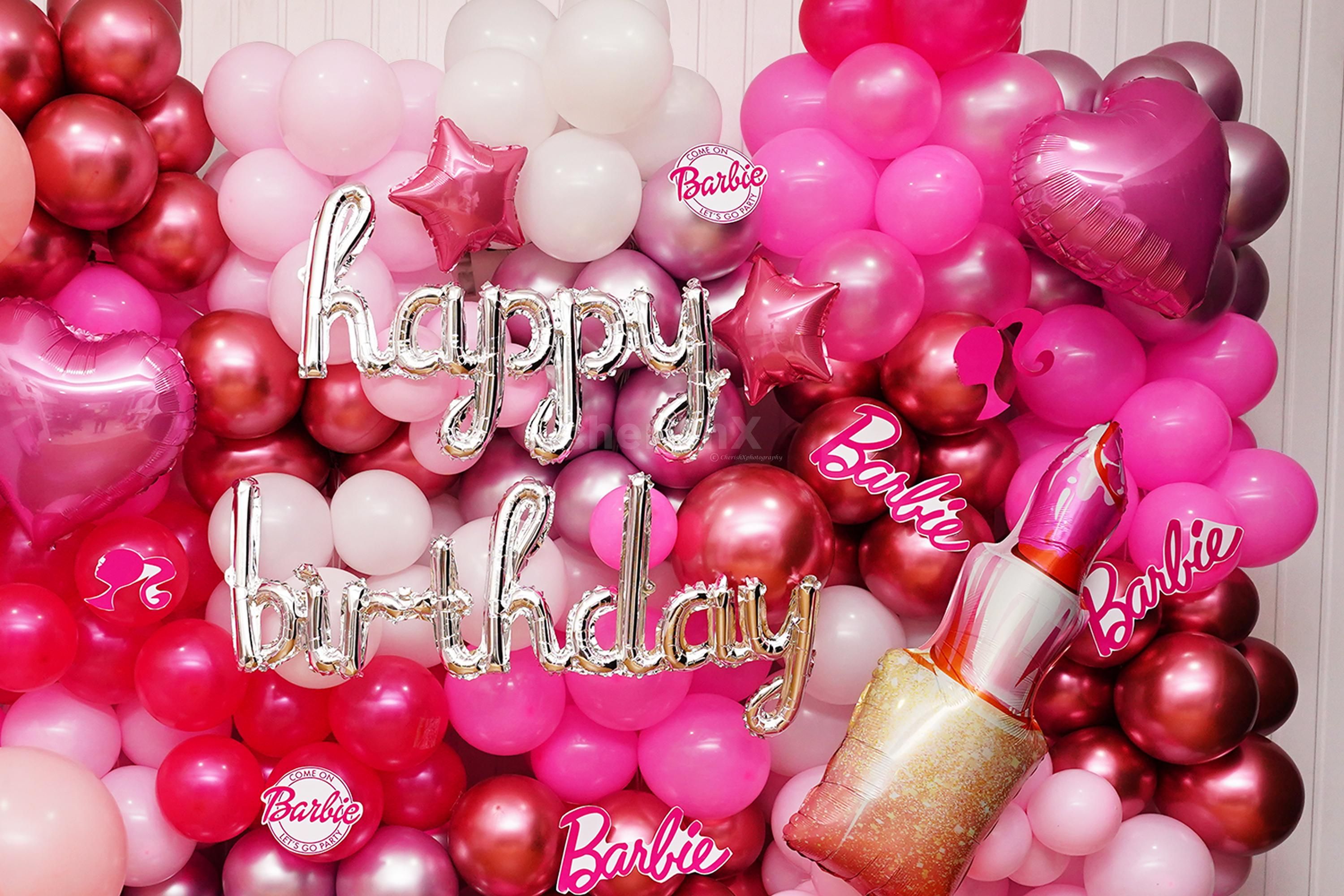 A big macaron Balloon adds for Barbie-themed fun.