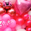 Light pink foil balloons set the dreamy ambience.