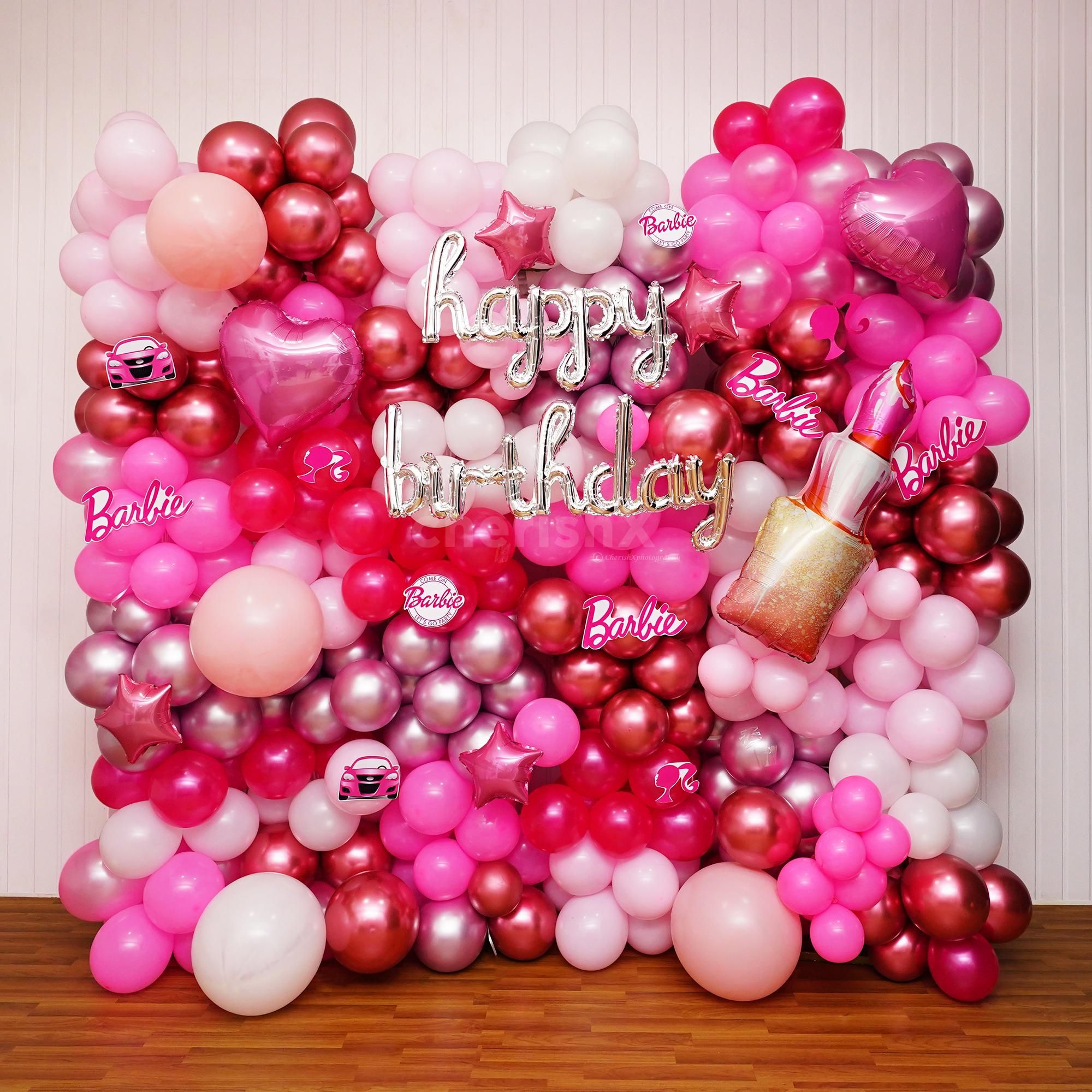 Iconic Barbie glam with lipstick foil balloon.