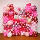 Iconic Barbie glam with lipstick foil balloon.