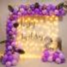 Enchanting Purple Delight with a glow of lights and foil butterflies