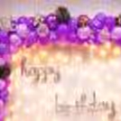 Splendid happy birthday foil balloons and pixel lights cast a mesmerizing glow.
