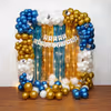 Golden chrome, blue chrome, and white balloons, along with butterfly cutouts, add a touch of whimsy and enchantment to the anniversary decorations.
