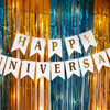 Personalize your anniversary decor with LED lights, welcome boards, theme invites, and more to add your own unique touch to the gold skyline decorations.
