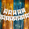Personalize your anniversary decor with LED lights, welcome boards, theme invites, and more to add your own unique touch to the gold skyline decorations.