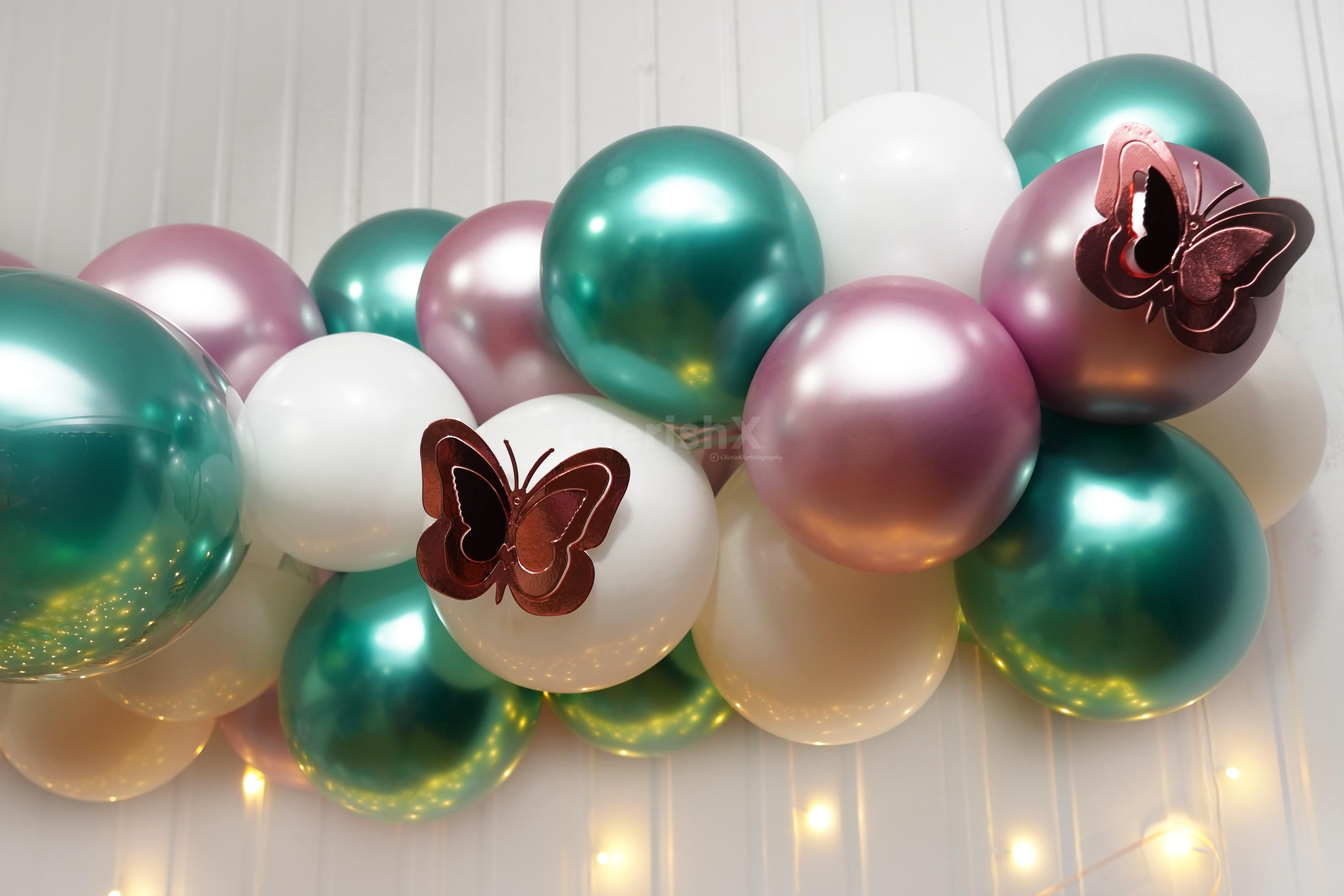 The cute butterfly stickers enhance the charm of the decor.
