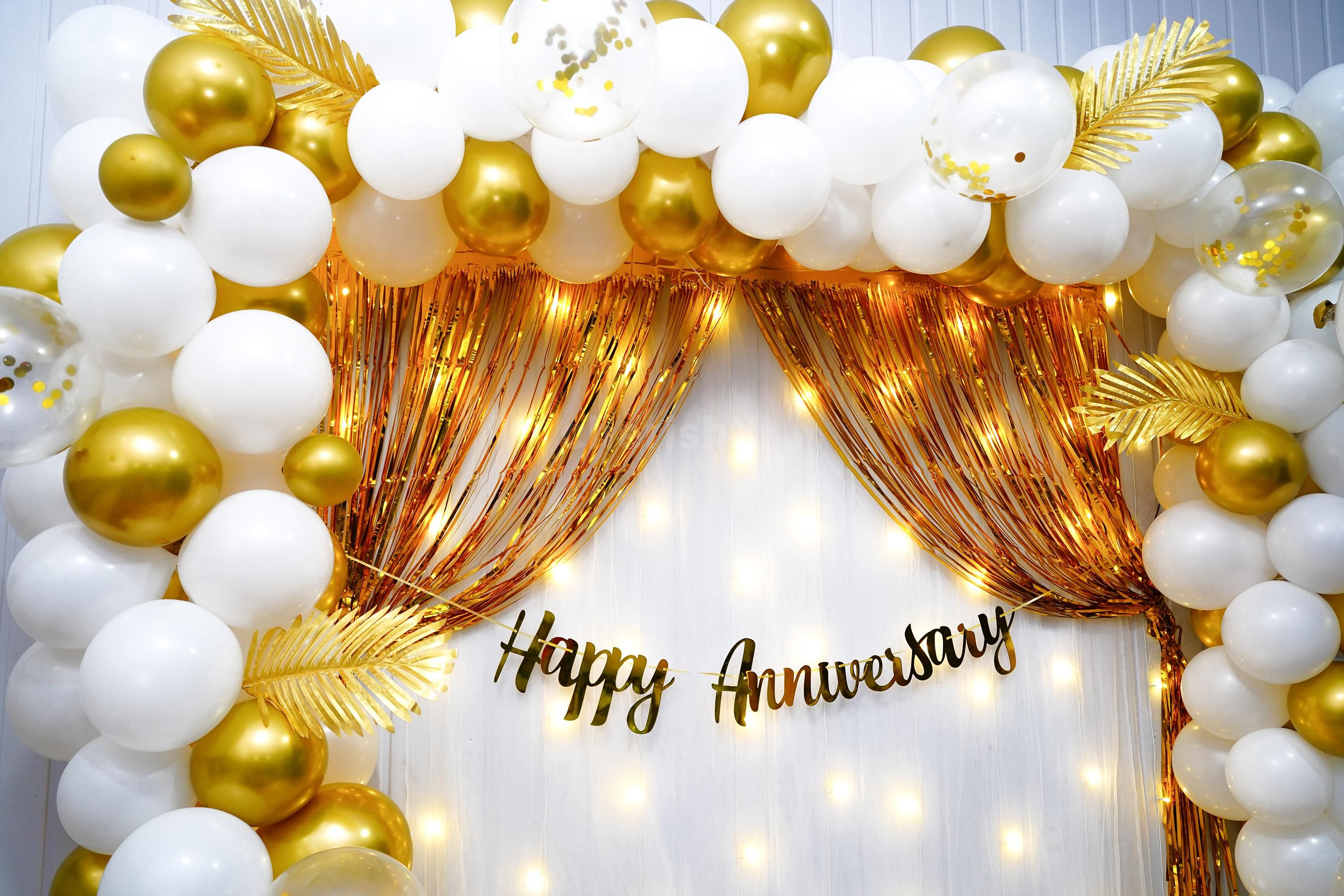 Experience the magic of togetherness like never before with our fairylike backdrop adorned with white and golden frills.