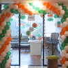 Your office will glow in tri-colour balloons, paper lanterns, and pixel lights.