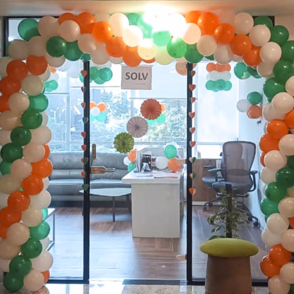 Your office will glow in tri-colour balloons, paper lanterns, and pixel lights.