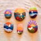 Our artist guides the children through painting a magical world of stars, moon, and whimsical creatures on pebbles.