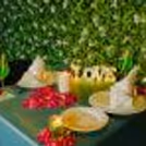 Delight in the Intimate Ambience, adorned with Flower Petals and Flickering Candles.