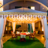 Immerse in a world of enchantment with Fountain Side Gazebo Dining at Umrao.