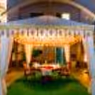 Immerse in a world of enchantment with Fountain Side Gazebo Dining at Umrao.