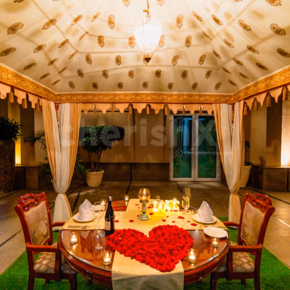 Delight in a symphony of rose petals, LOVE LED lights, and impeccable service under the starlit sky.