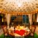 Delight in a symphony of rose petals, LOVE LED lights, and impeccable service under the starlit sky.