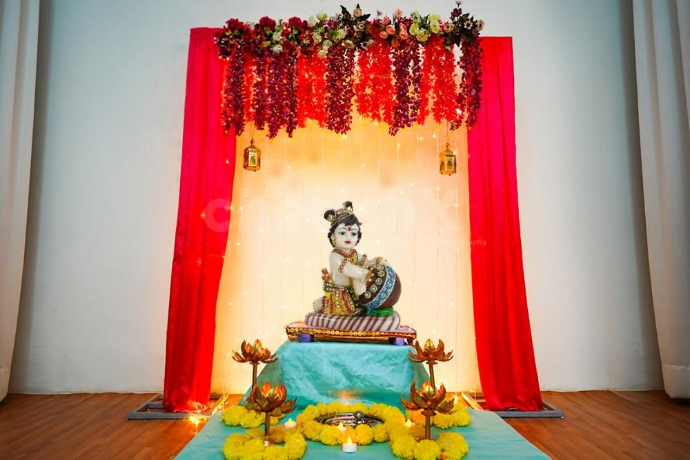 Elevate your Janmashtami celebrations with our divine Flowers Decorations, creating a spiritual aura for Lord Krishna's arrival.